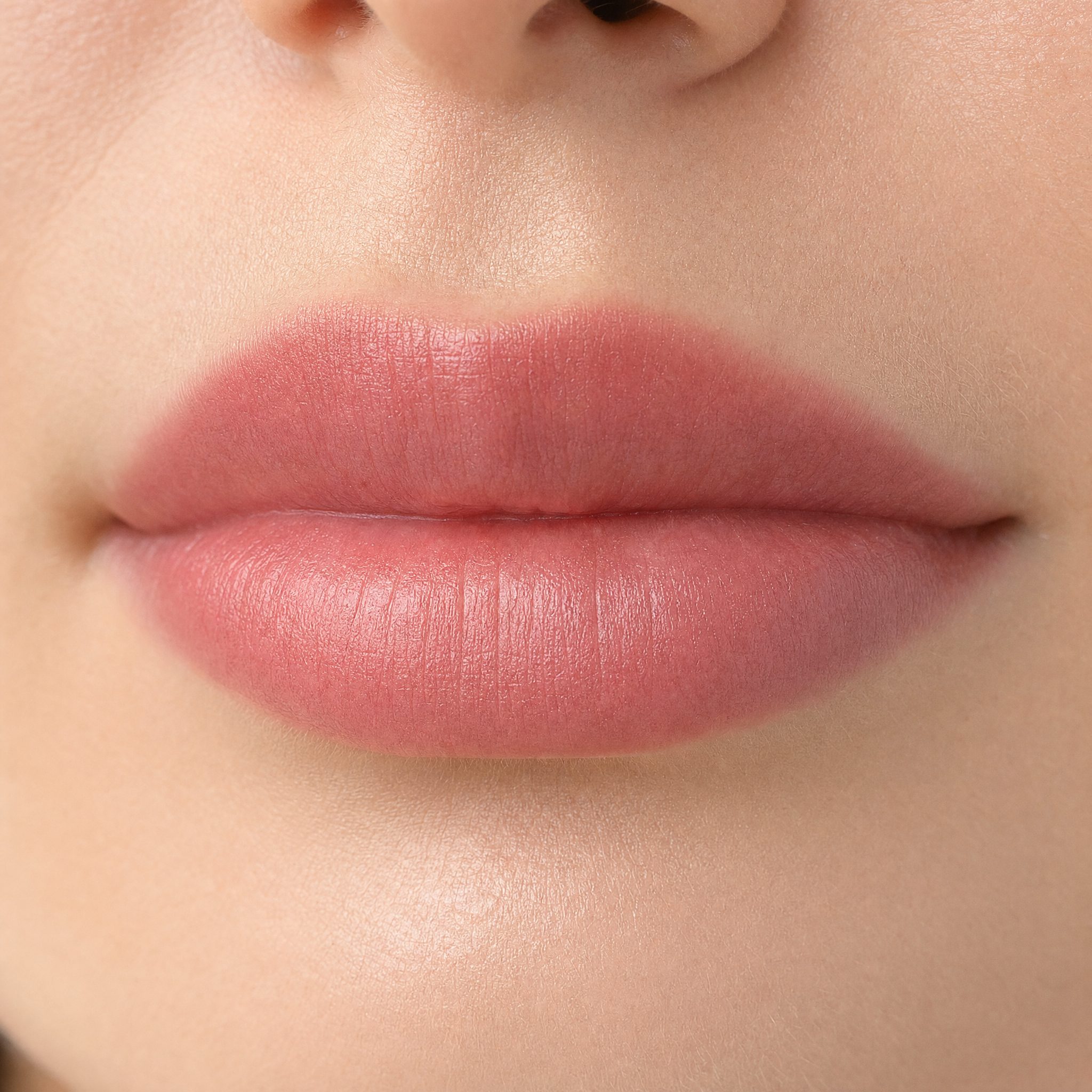 Close-up of healed lip blushing showing a soft, natural rosy tint